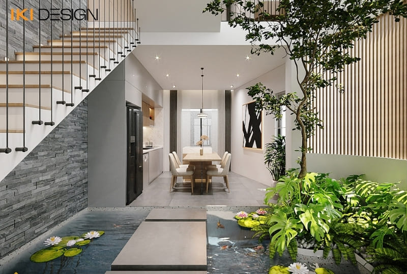 Thiết kế hòa hợp giữa cầu thang hồ cá và cây xanh