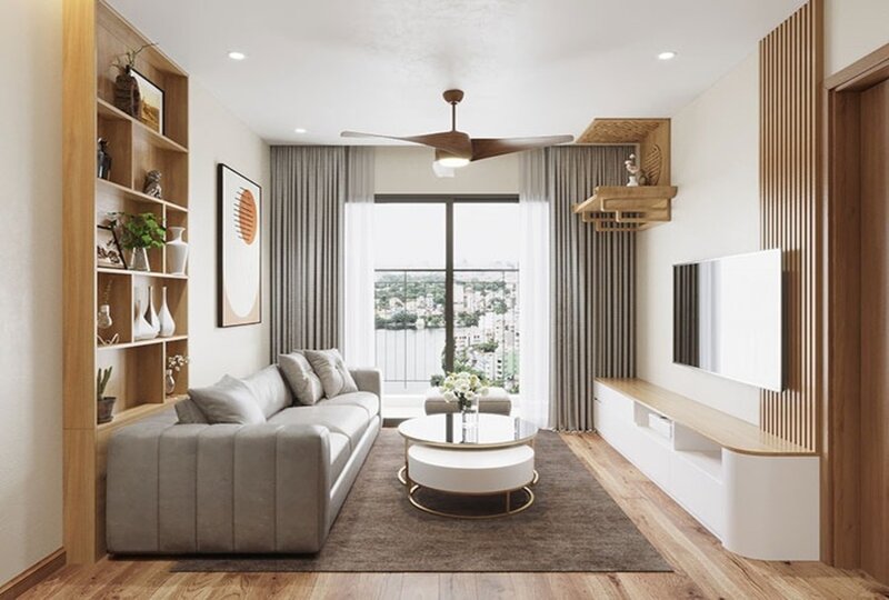 Phòng khách căn hộ 55m2 sử dụng sofa kích thước vừa phải và TV treo tường để giữ diện tích sàn thông thoáng