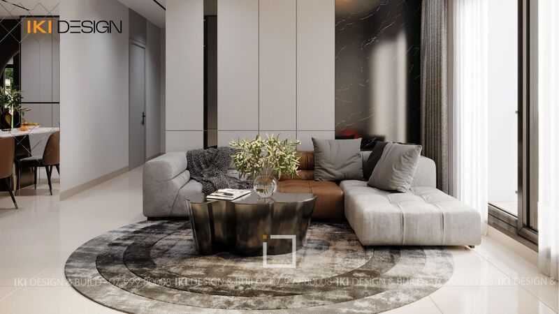 Phòng khách căn hộ 60m2 với sofa góc chữ L và bàn trà nhỏ gọn